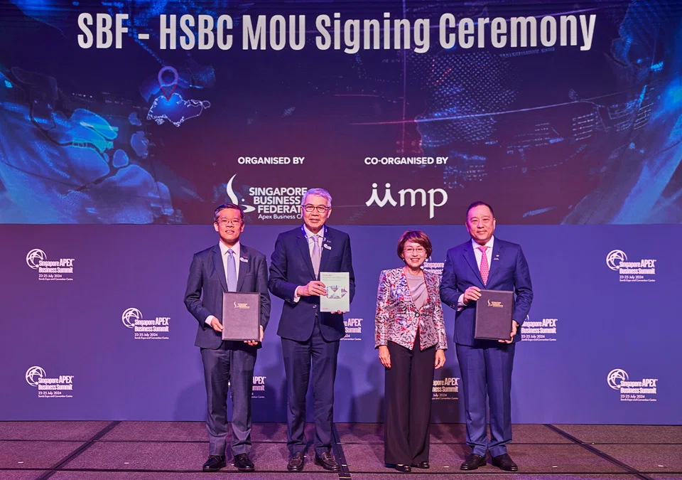 At the signing ceremony on Jul 24 were (from left) SBF CEO Kok Ping Soon, SBF chairman Lim Ming Yan, HSBC Singapore chairwoman Penny Goh, and HSBC Singapore CEO Wong Kee Joo.