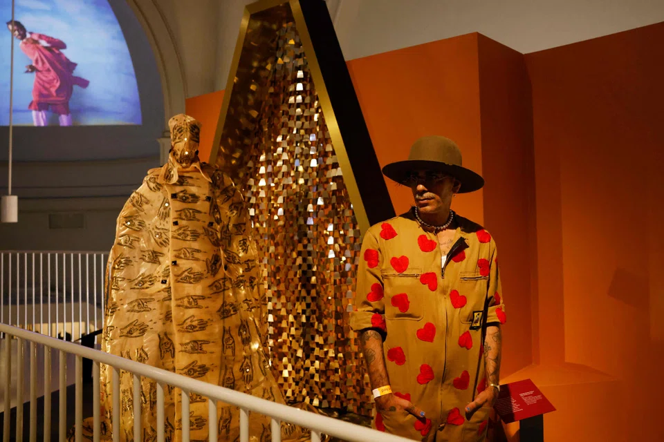 Moroccan fashion designer Artsi Ifrach and his creation A Dialogue Between Cultures at the Africa Fashion exhibition.