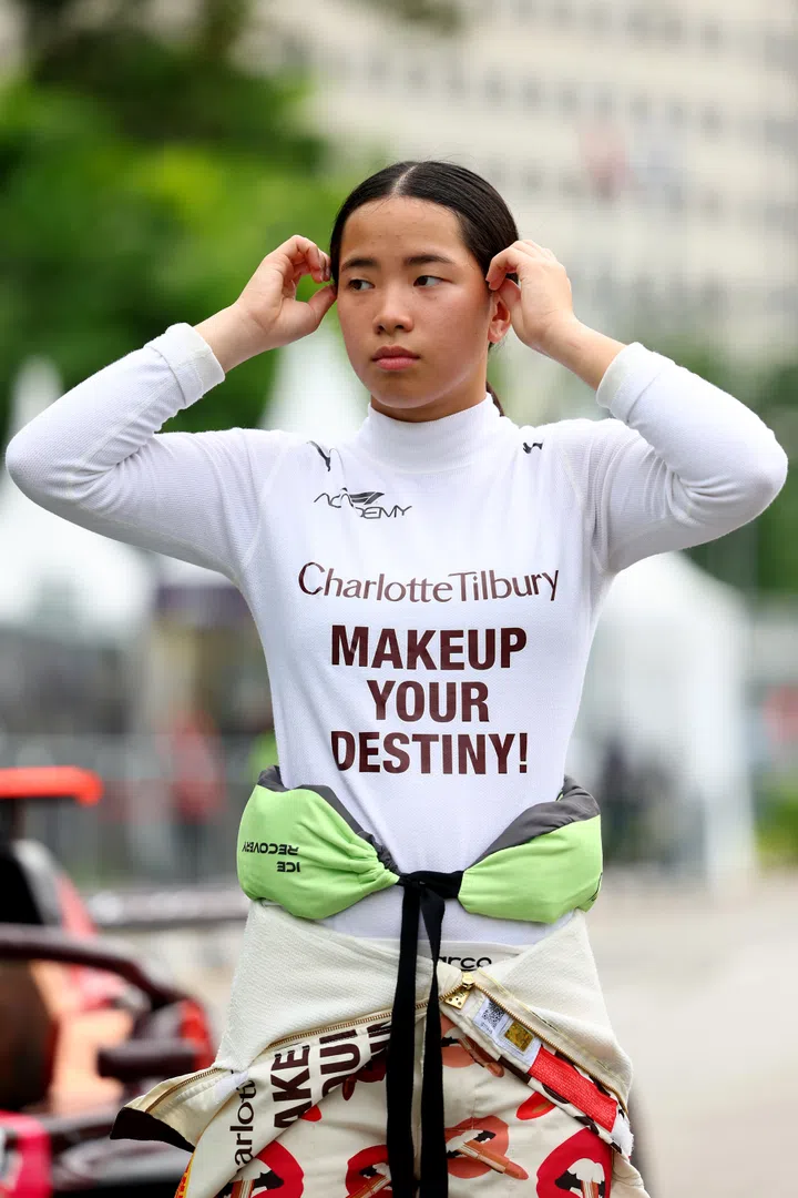 SINGAPORE, SINGAPORE - OCTOBER 03: Chloe Chong of Great Britain and Rodin Motorsport (27) looks on during qualifying ahead of F1 Academy Round 6 at Marina Bay Street Circuit on October 03, 2025 in Singapore, Singapore. (Photo by Colin McMaster/LAT Images)