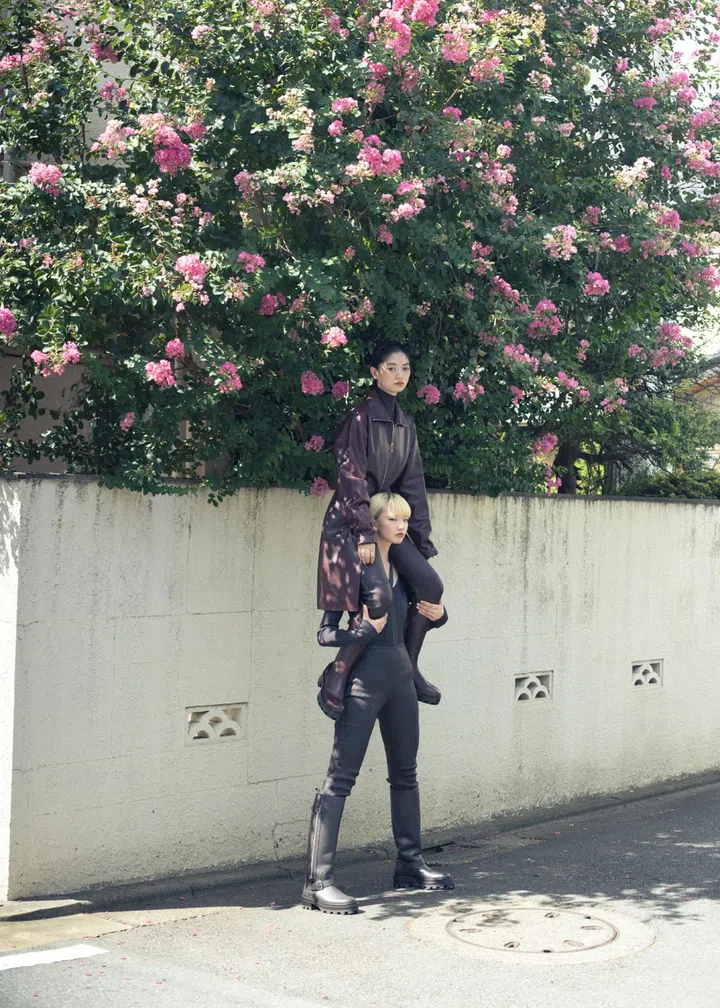 Japanese photographer Osamu Yokonami models carrying each other