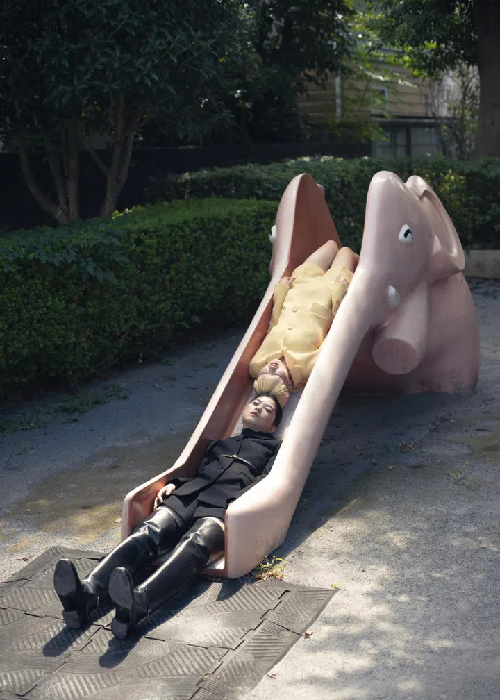 Japanese photographer Osamu Yokonami models on slide