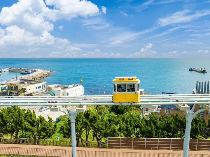 The Haeundae Beach Train (also called the Sky Capsule) runs between Mipo and Songjeong on the Busan Green Railway and offers a breathtaking view of the beautiful scenery of Dongbu Mountain. Busan, South Korea.