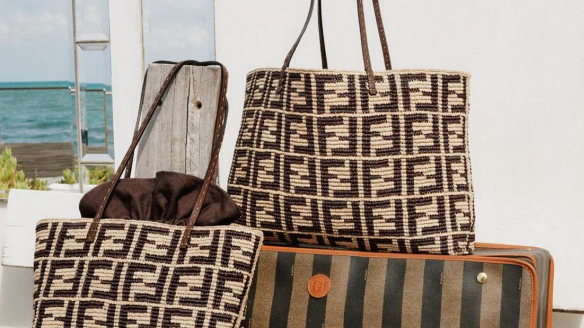 F monogram marks the spot for these Fendi wicker totes. Credit: Fendi