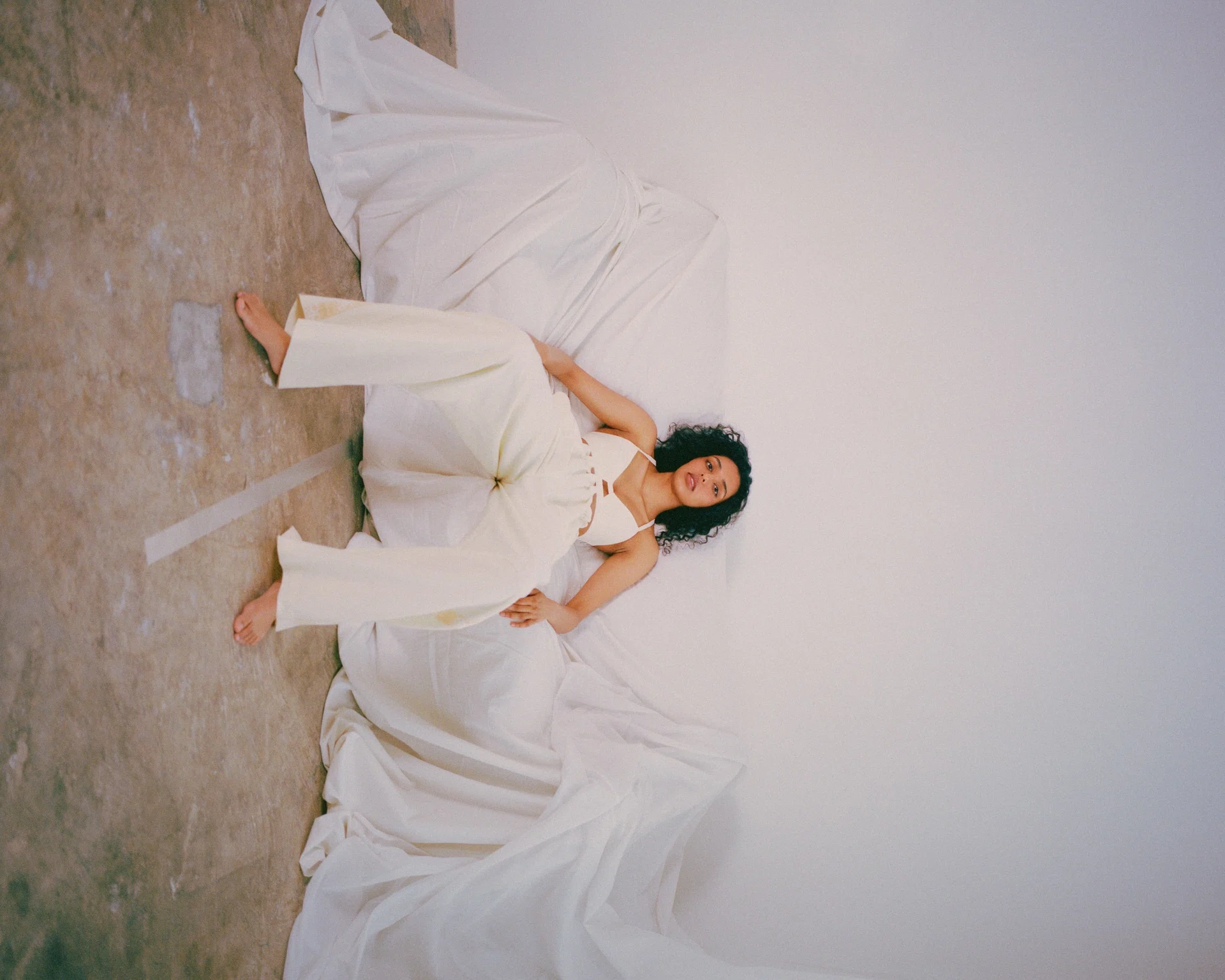 A model lounging on a couch