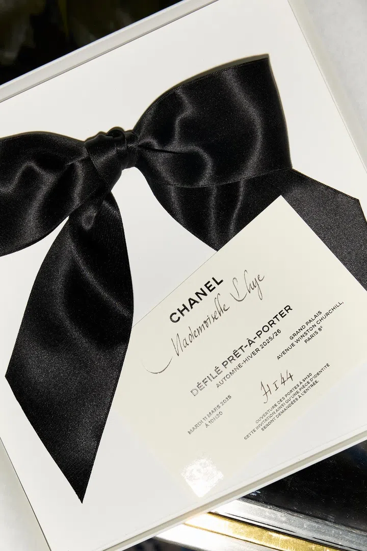 Singapore musician Shye’s invite card to the Chanel FW25 show in Paris
