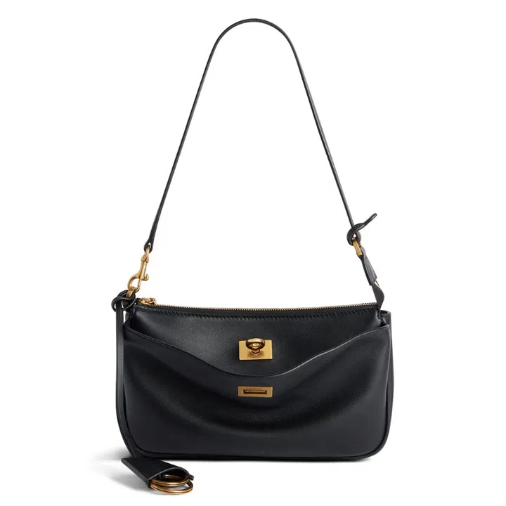 Rodeo Sling Pochette leather shoulder bag, $2,400, Balenciaga