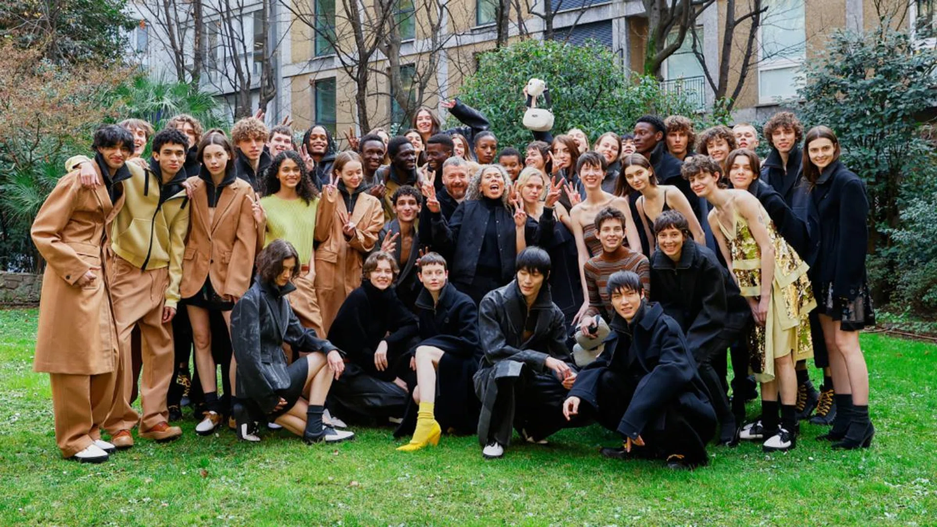 Onitsuka Tiger's creative director, Andrea Pompilio (seventh from the left in the middle row), with models who walked in the brand's Urban Winter show in February. Credit: Onitsuka Tiger 