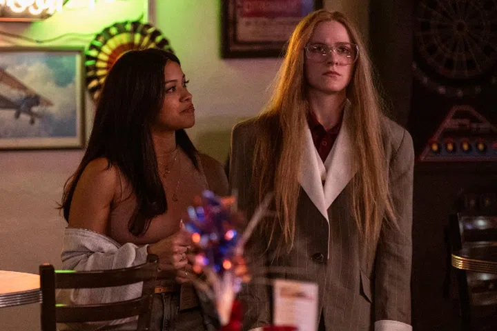 Gina Rodriguez (left) stars as "Melanie" and Evan Rachel Wood (right) stars as "Old Dolio Dyne" in director Miranda July's KAJILLIONAIRE, a Focus Features release. Credit : Matt Kennedy / Focus Features