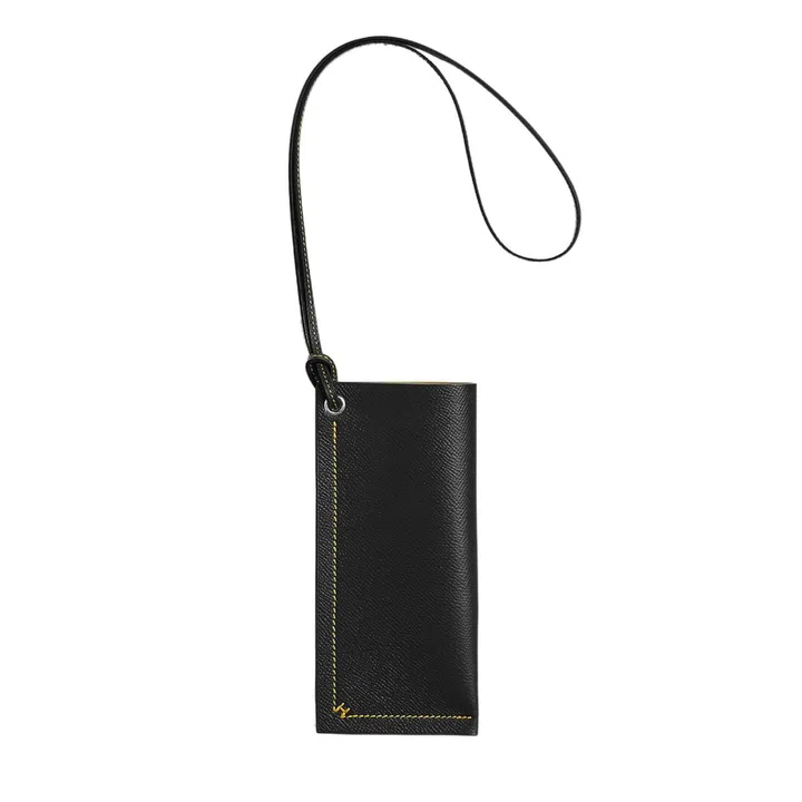 Leather glasses case, $1,200, Hermes