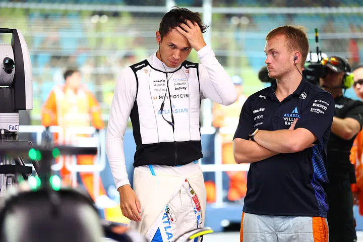 SINGAPORE, SINGAPORE - OCTOBER 03: Alexander Albon of Thailand and Williams looks on in the garage during practice ahead of the F1 Grand Prix of Singapore at Marina Bay Street Circuit on October 03, 2025 in Singapore, Singapore. (Photo by Bryn Lennon/Getty Images)