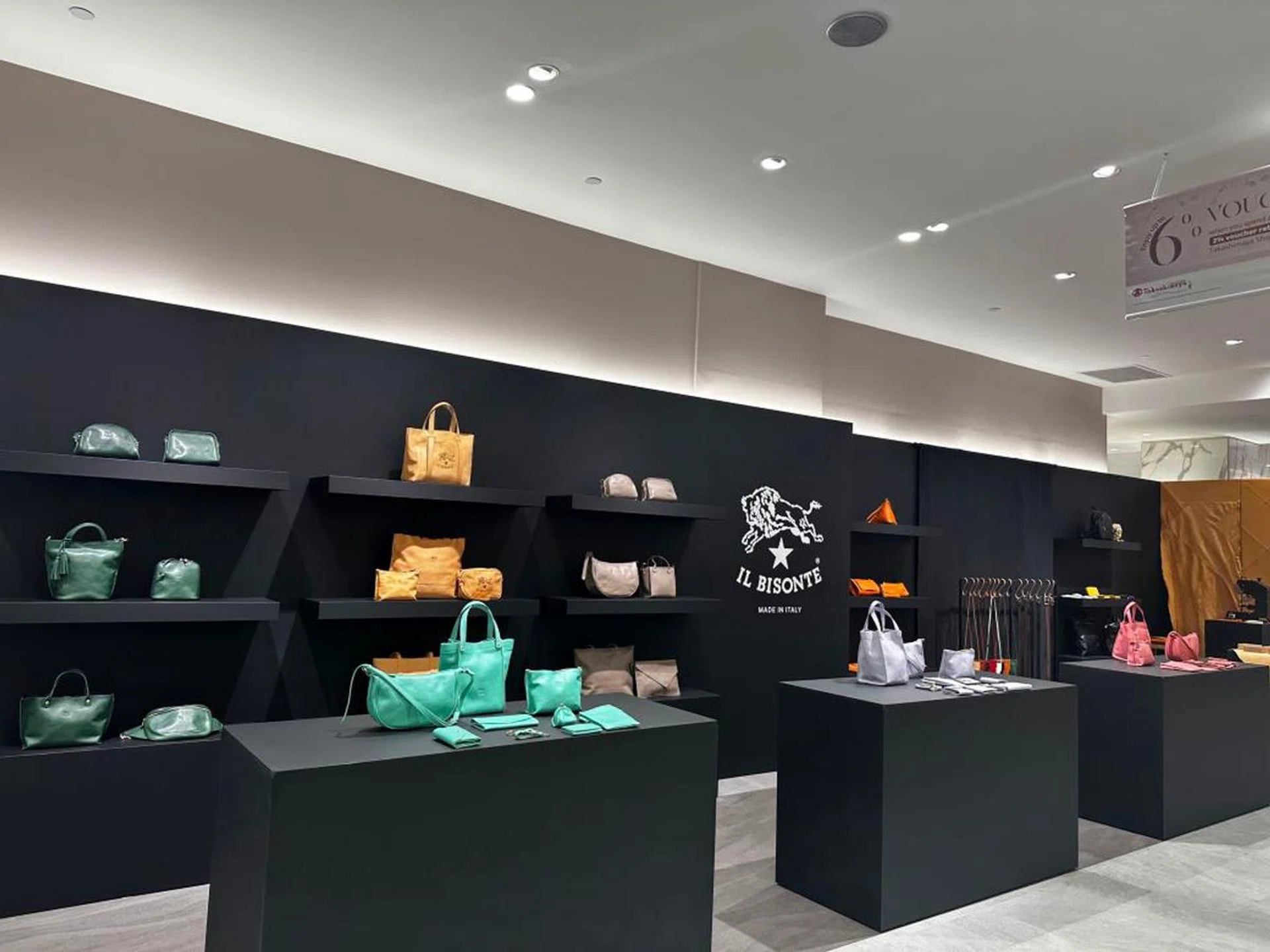 Step into Il Bisonte’s sleek pop-up to browse their variety of bags and accessories made with timeless Italian craftsmanship and rich, vibrant leather. Credit: Il Bisonte 