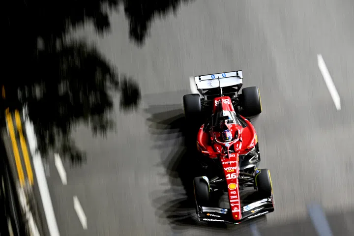 SINGAPORE, SINGAPORE - OCTOBER 03: Charles Leclerc of Monaco driving the (16) Scuderia Ferrari SF-25 on track during practice ahead of the F1 Grand Prix of Singapore at Marina Bay Street Circuit on October 03, 2025 in Singapore, Singapore. (Photo by Clive Mason/Getty Images)