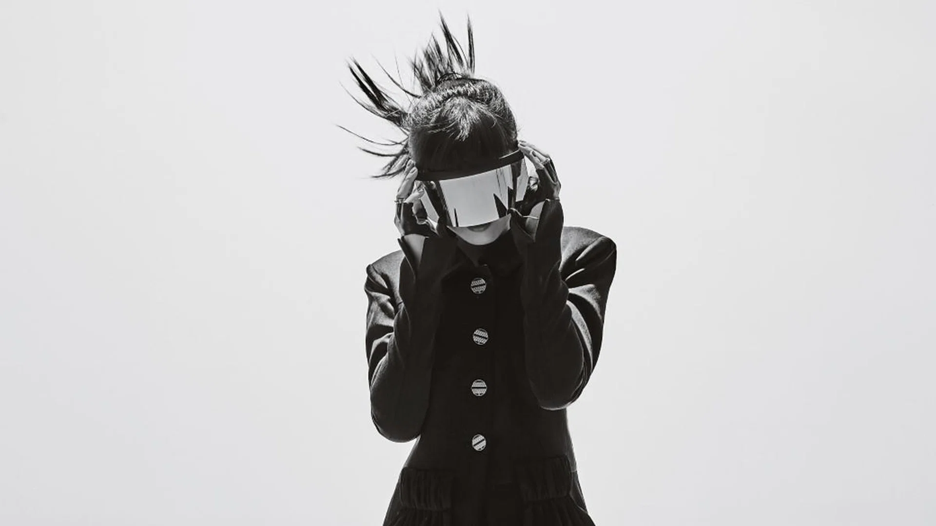 Sokko wears Chanel satin jacket and matching skirt, and her own accessories. Credit: Tan Wei Te