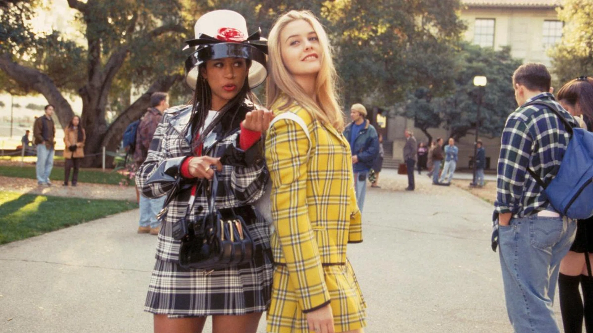 Get clued in on the skirt suit trend as seen in '90s teen classic Clueless. Credit: Everett Collection