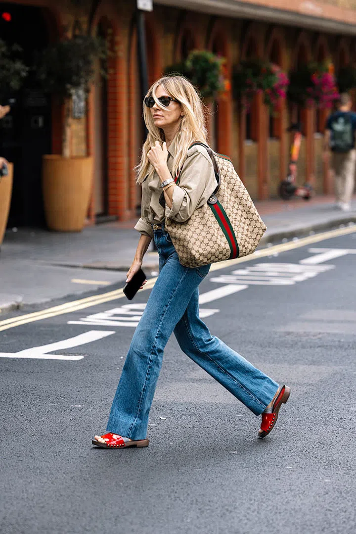 LONDON, ENGLAND - AUGUST 07: (EDITORS NOTE: Image has been edited for privacy reasons.) Sienna Miller is seen on August 07, 2025 in London, England. (Photo by Ricky Vigil/Getty Images for Gucci)