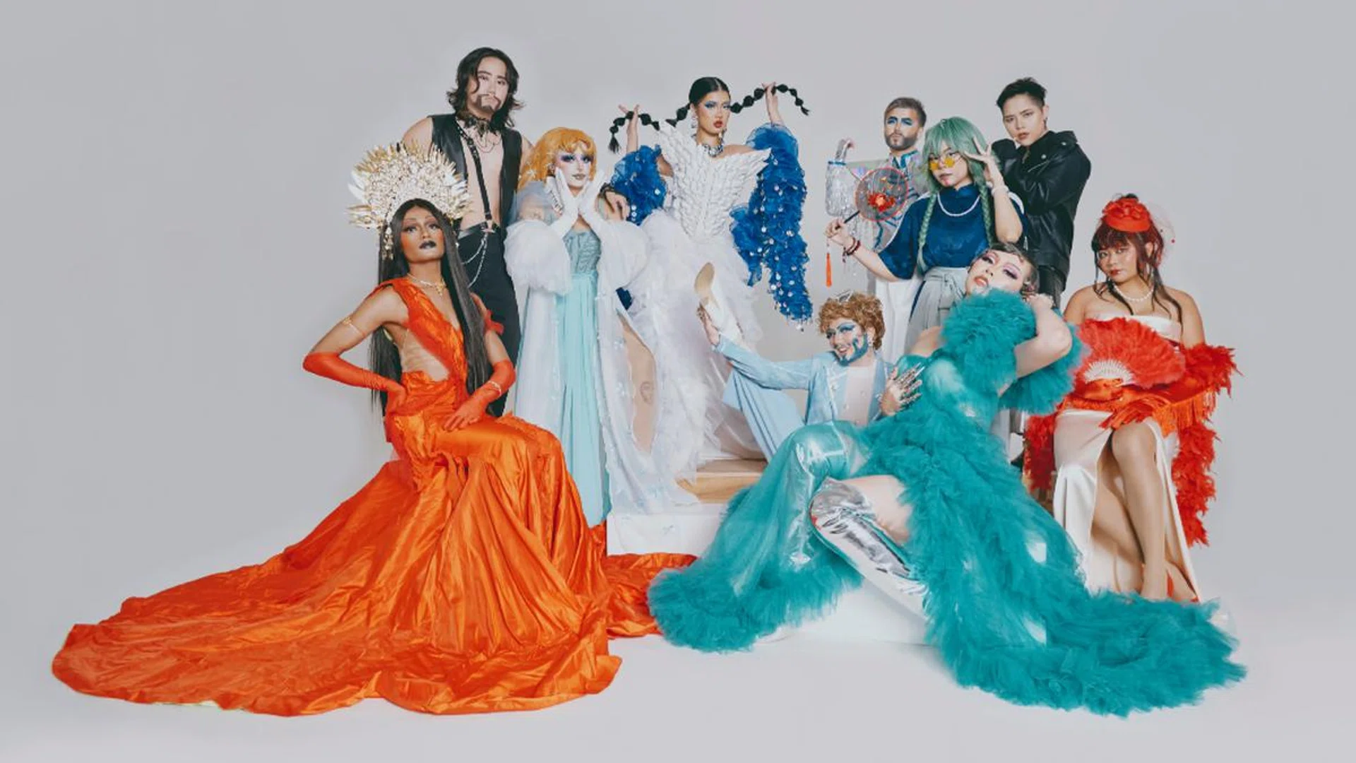 Drag and burlesque performer Lychee Bye (pictured fourth from left, in a white gown and blue stole) and some of the participants from various editions of The Fruit Basket, the incubation programme she started for drag newbies. Credit: Athirah Annissa