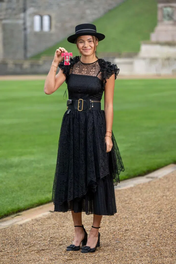Tennis player Emma Raducanu after she was made a MBE (Member of the Order of the British Empire) by King Charles III at Windsor Castle on November 29, 2022 in Windsor, England. (Photo by Paul Grover - WPA Pool/Getty Images)