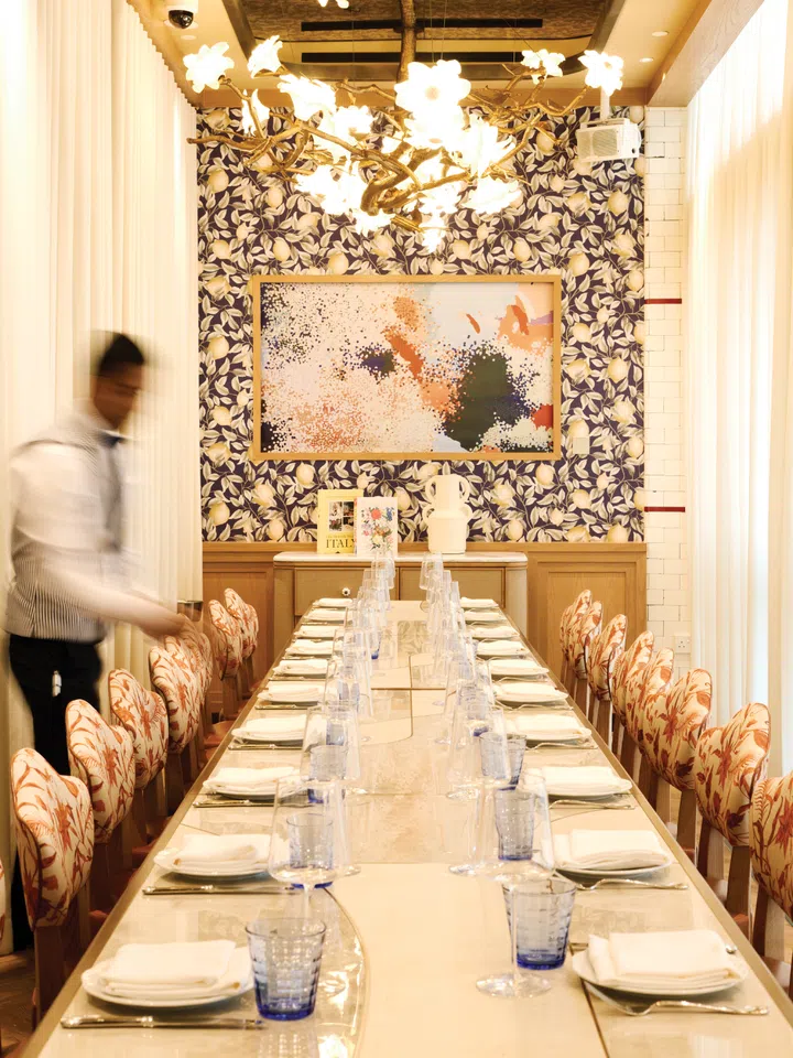 Private Dining Room at LAVO Marina Bay Sands with floor-to-ceiling windows offering chic, intimate dining and panoramic views of Singapore’s skyline.