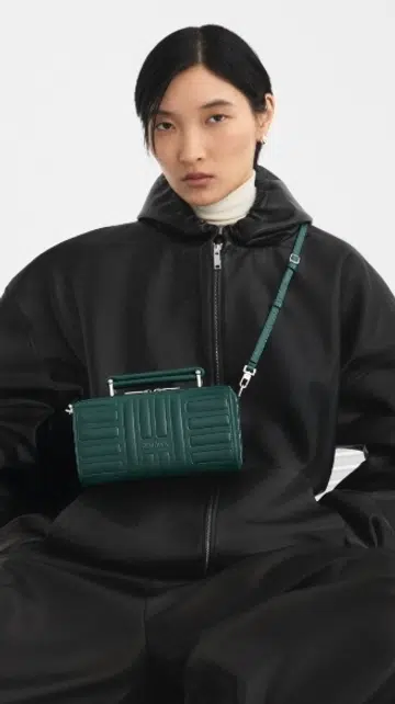 rimowa groove leather bag