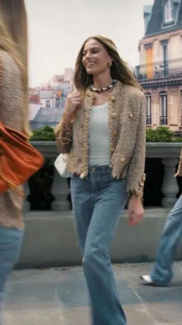 Margot Robbie for the Chanel 25 handbag campaign, a 2026 homage to Kylie Minogue’s “Come Into My World” music video directed by Michel Gondry.