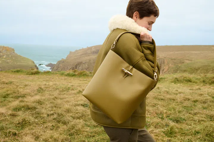 
shearling collared toggle coat and le roseau hobo shoulder bag in olive longchamp 2025 new winter collection