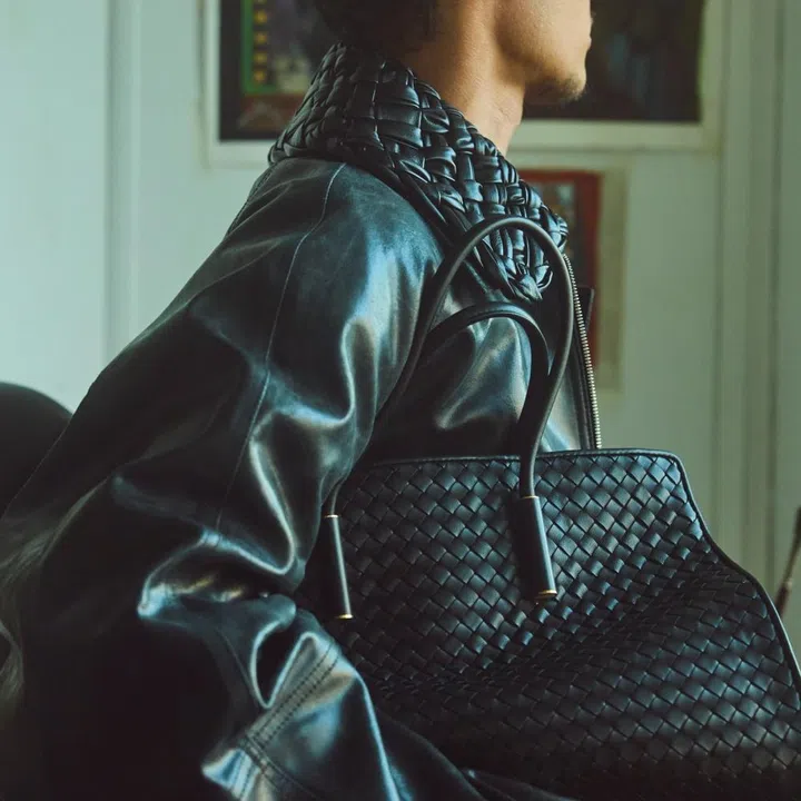 Bottega Veneta Intrecciato leather blouson and Barbara tote bag on artist Israfil Ridhwan for F ZINE.