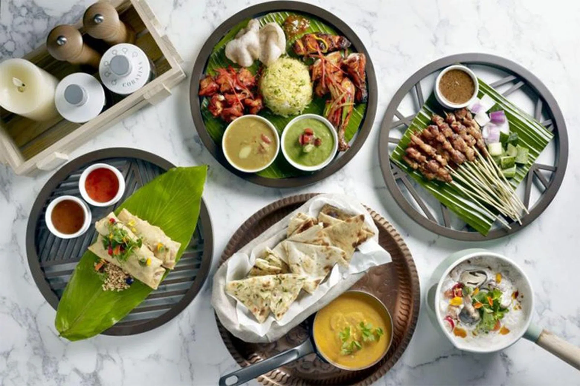 Enjoy Asian dishes (above) at buffet restaurant Food Exchange in Novotel Singapore on Stevens. Photo: Novotel Singapore On Stevens