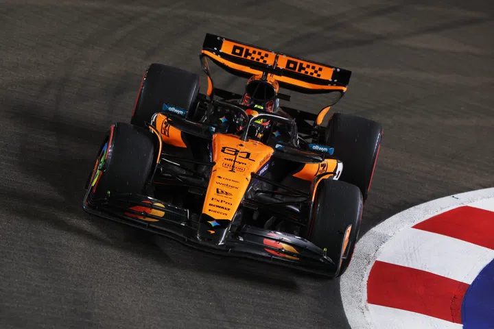 SINGAPORE, SINGAPORE - OCTOBER 03: Oscar Piastri of Australia driving the (81) McLaren MCL39 Mercedes on track during practice ahead of the F1 Grand Prix of Singapore at Marina Bay Street Circuit on October 03, 2025 in Singapore, Singapore. (Photo by Steven Tee/LAT Images)