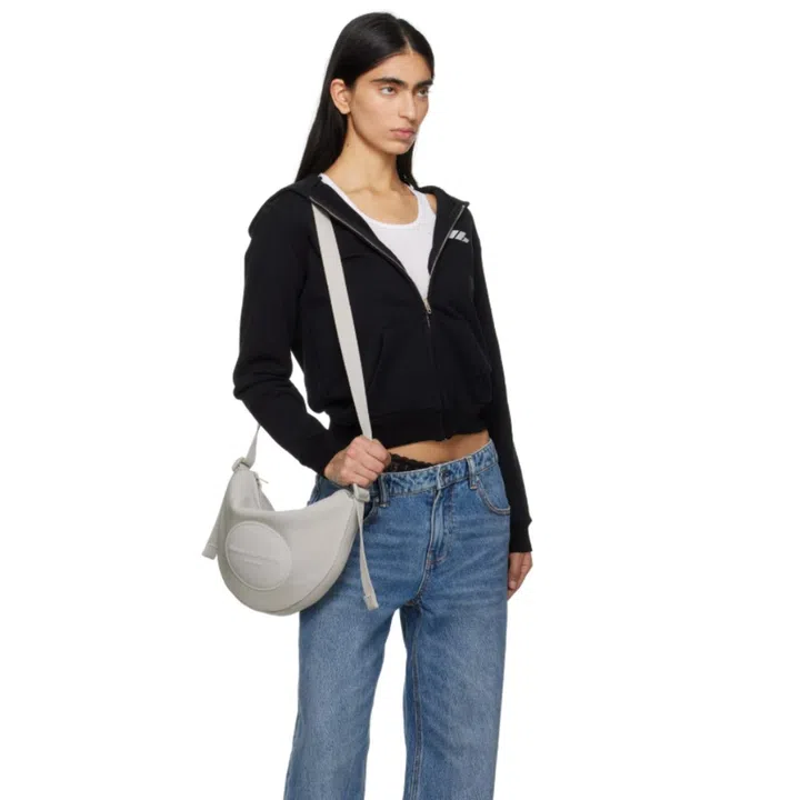 A grey Alexander Wang crossbody bag