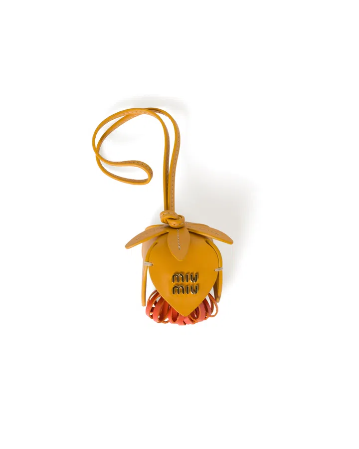 miu miu holiday collection 2024 leather trick yellow acorn