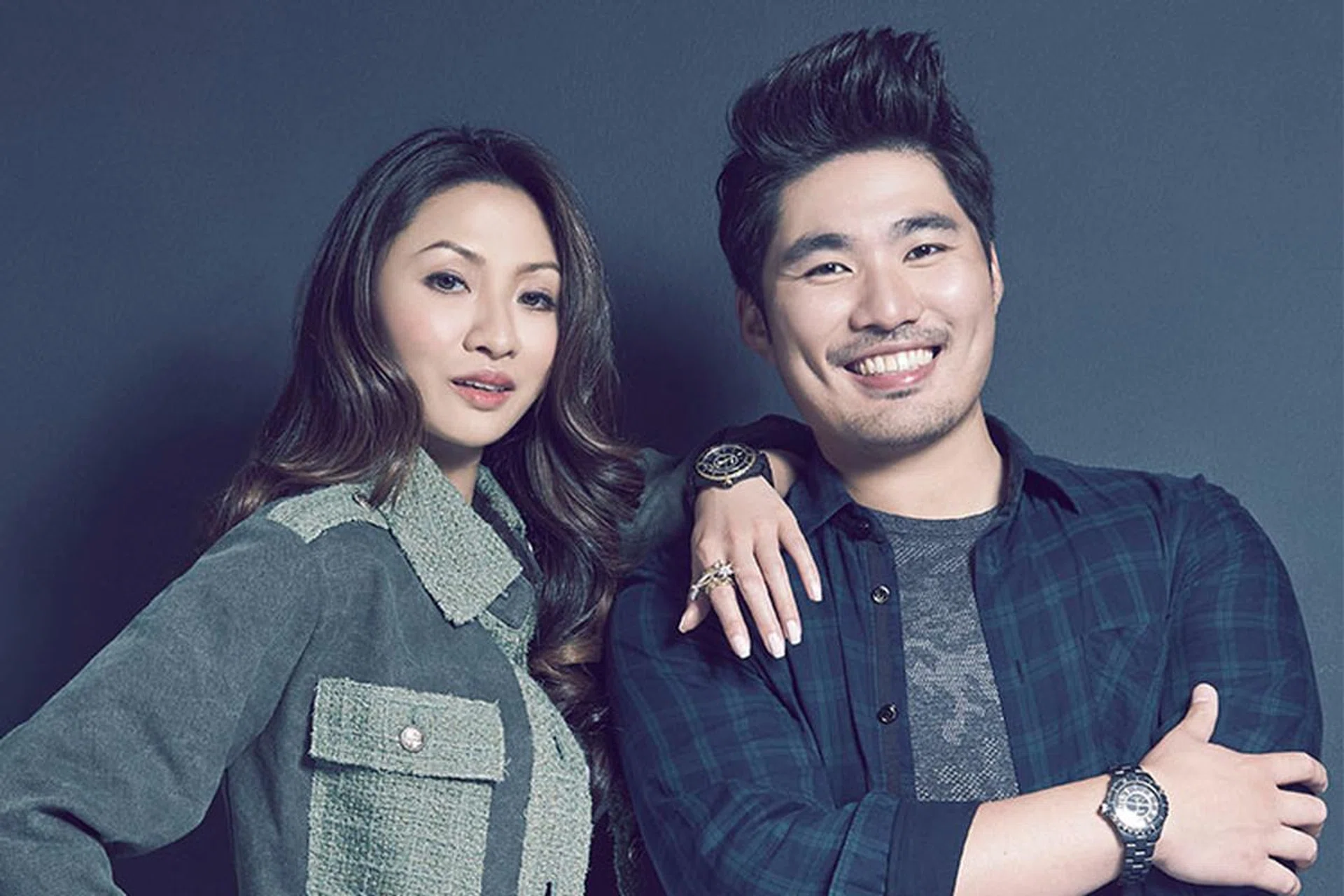 On Valerie: Medium Coco Crush rings in 18K yellow and white gold (on right hand), J12 Calibre 3125 ceramic watch, Entrelacs d’Etoiles 18K white and yellow gold ring with diamonds, and cotton toile shirt. On Calvin: J12 ceramic and steel watch. All clothes, his own