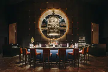 Inside Koma Marina Bay Sands’ bar – where Japanese-inspired cocktails like Heavenly Match-A (right) meet one of Singapore’s most stylish nightlife spots.