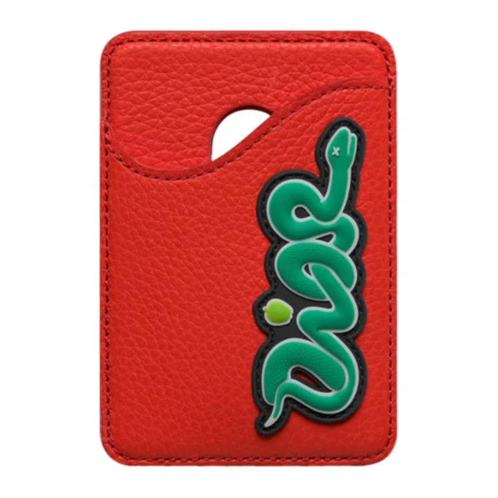 Dior and Kaws Saddle leather magnetic card holder, $590, Dior