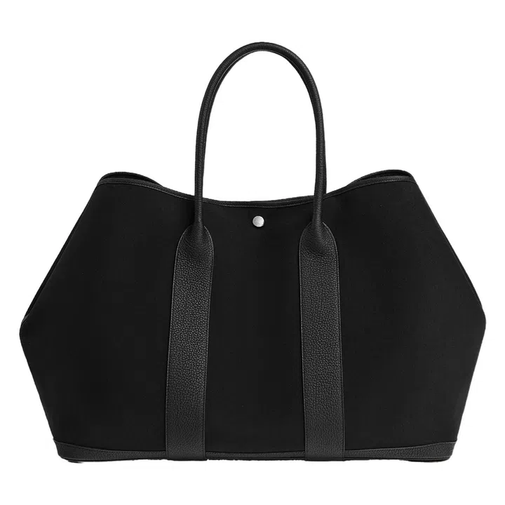 Garden Party 49 leather and canvas bag, $8,000, Hermes