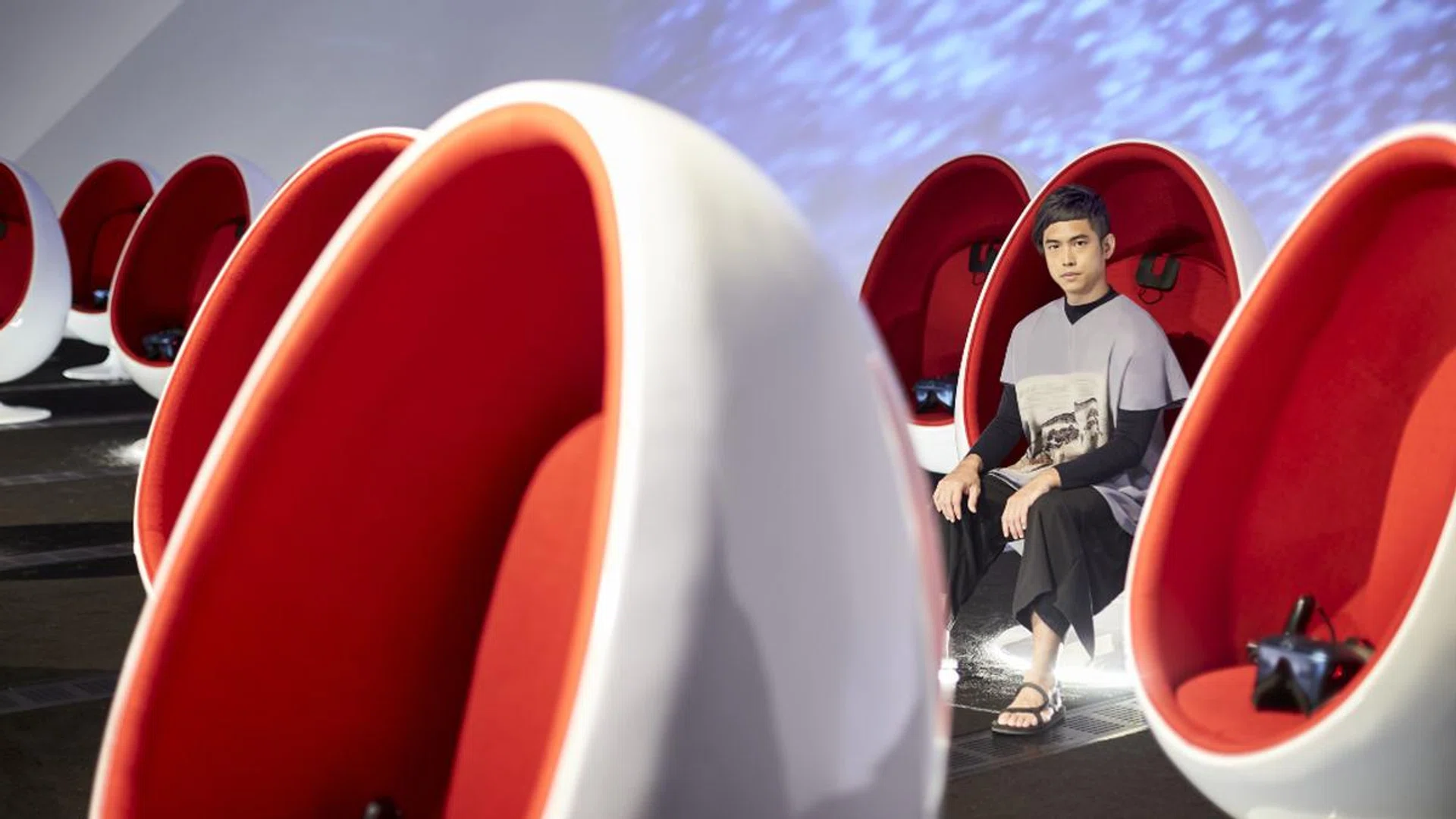 As head of the ArtScience Museum’s VR gallery (pictured here), Jerome Chee’s programming work sees him having to straddle between the experimental and accessible to drawnew audiences to the emerging medium. Credit: Phyllicia Wang