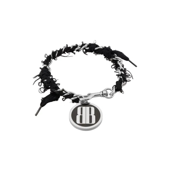 Balenciaga Nano lace, brass and polyester choker, $1,590