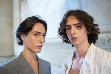 Male models backstage at Peet Dullaert F/W 2025 show