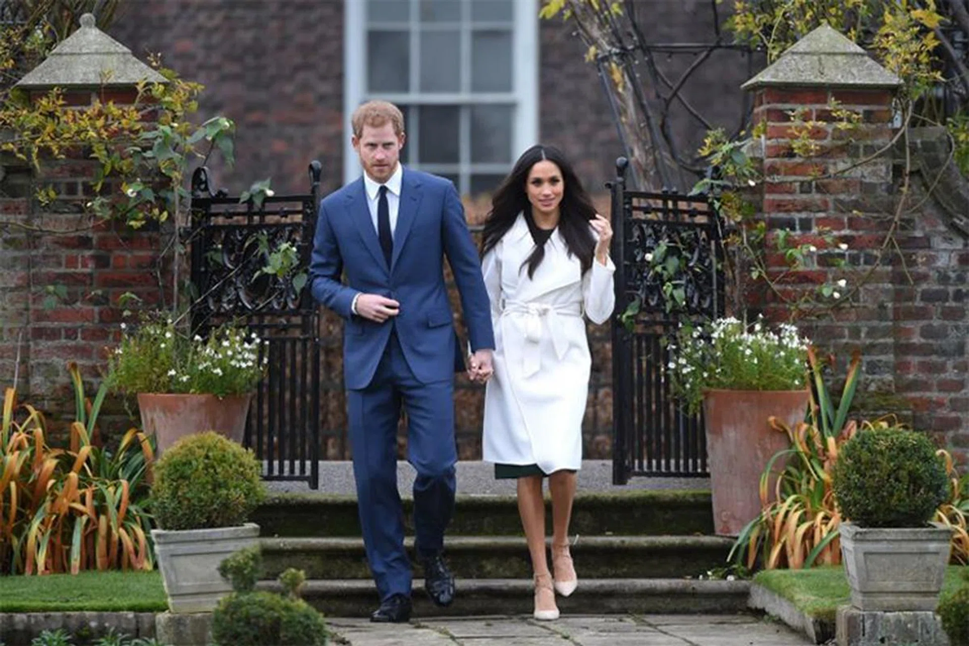 The white wrap coat created by Canadian label Line sold out quickly after Ms Meghan Markle stepped out in it after getting engaged to Prince Harry. Photo: Epa-Efe