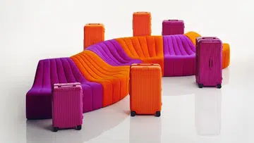 Rimowa orange and magenta luggage
