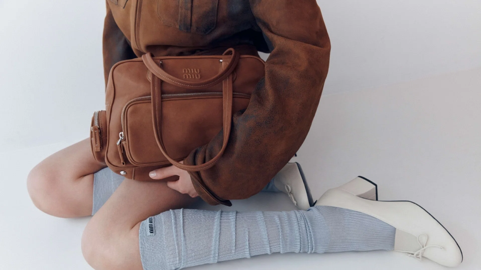 Model poses with the Miu Miu Pocket Bag