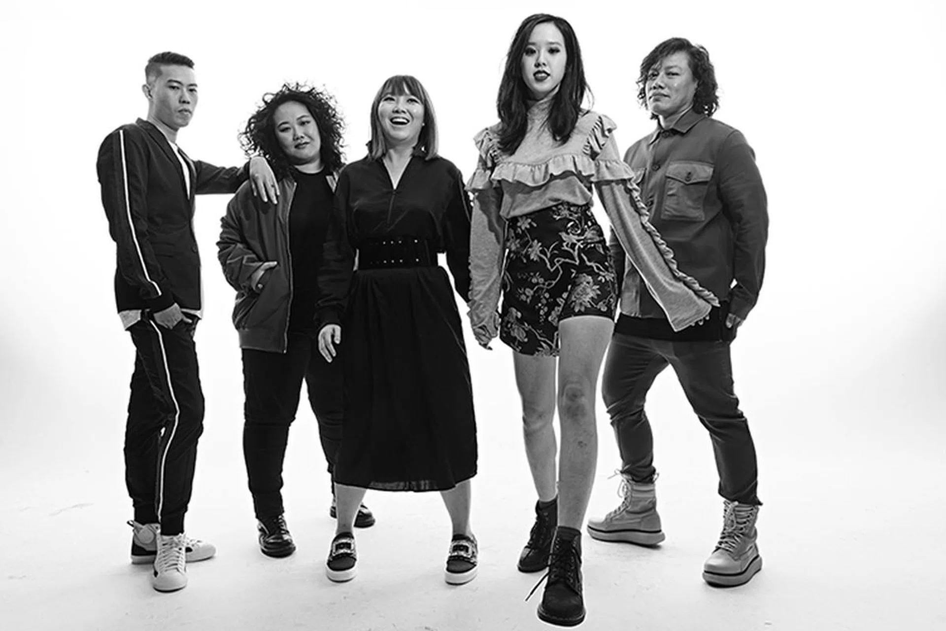 (From left) On Tan: Polyester suit and cotton T-shirt, Calvin Klein Platinum. Onitsuka Tiger x Andrea Pompilio canvas and rubber sneakers, Onitsuka Tiger. On Mak: Polyester bomber jacket, H&M. All other items, her own. On Lee: Silk shirt dress and vinyl belt, H&M. Denim plimsolls with crystals, Roger Vivier. On Ko: Cotton top and embroidered satin wrap skirt, H&M. Boots, her own. On Supian: Cotton field jacket and matching pants, H&M. Onitsuka Tiger x Andrea Pompilio canvas and rubber boots, Onitsuka Tiger. T-shirt, his own