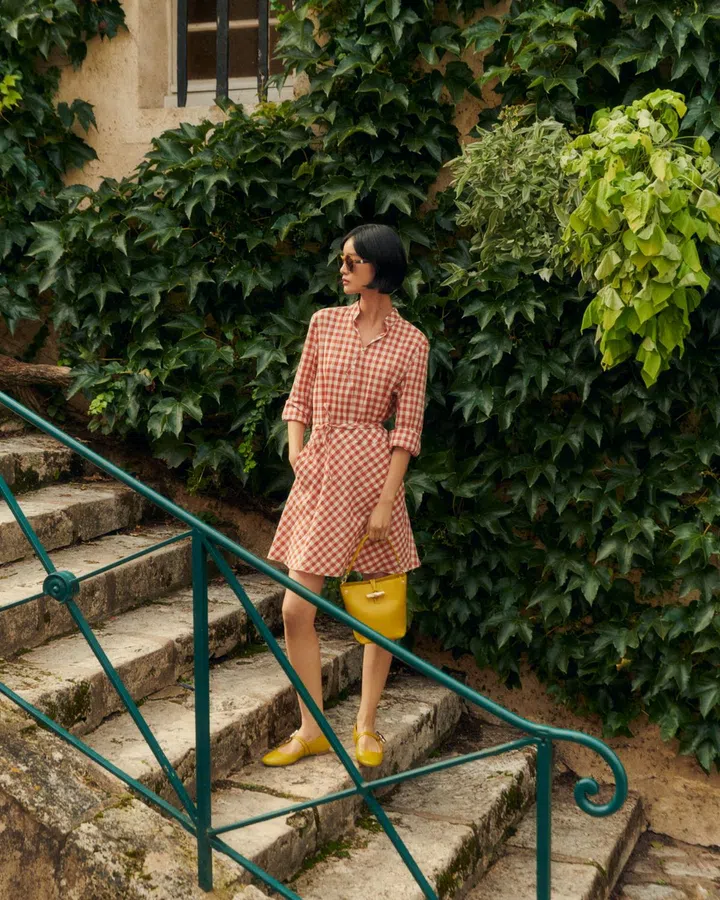 longchamp gingham pink summer dress paid with le roseau bucket handbag, summer 2025 collection