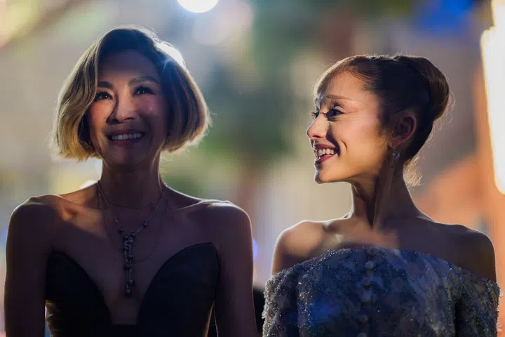 Wicked: For Good Singapore yellow carpet premiere Universal Studios Singapore Ariana Grande Michelle Yeoh