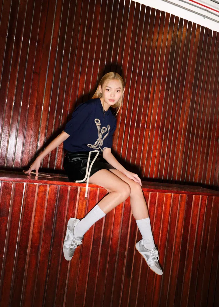 Louis Vuitton Sneakerina sneakers styled with a casual-chic outfit on Ally Teo