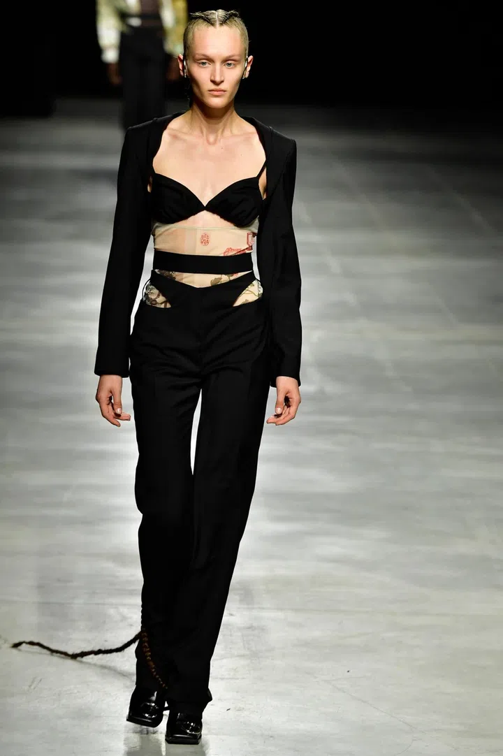 A model walking on runway wearing Act N1 Spring Summer 2022 women ready to wear fashion show on September  2021 in Milan, Italy