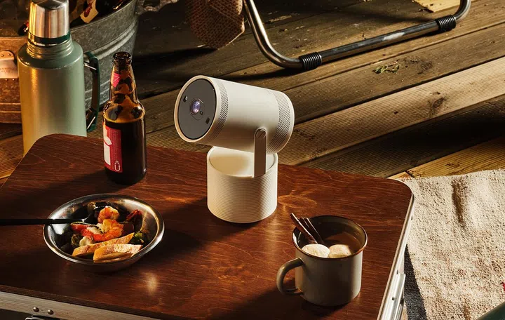 Samsung's The Freestyle projector is seen here with its companion Freestyle Portable Battery base. (Image source: Samsung)