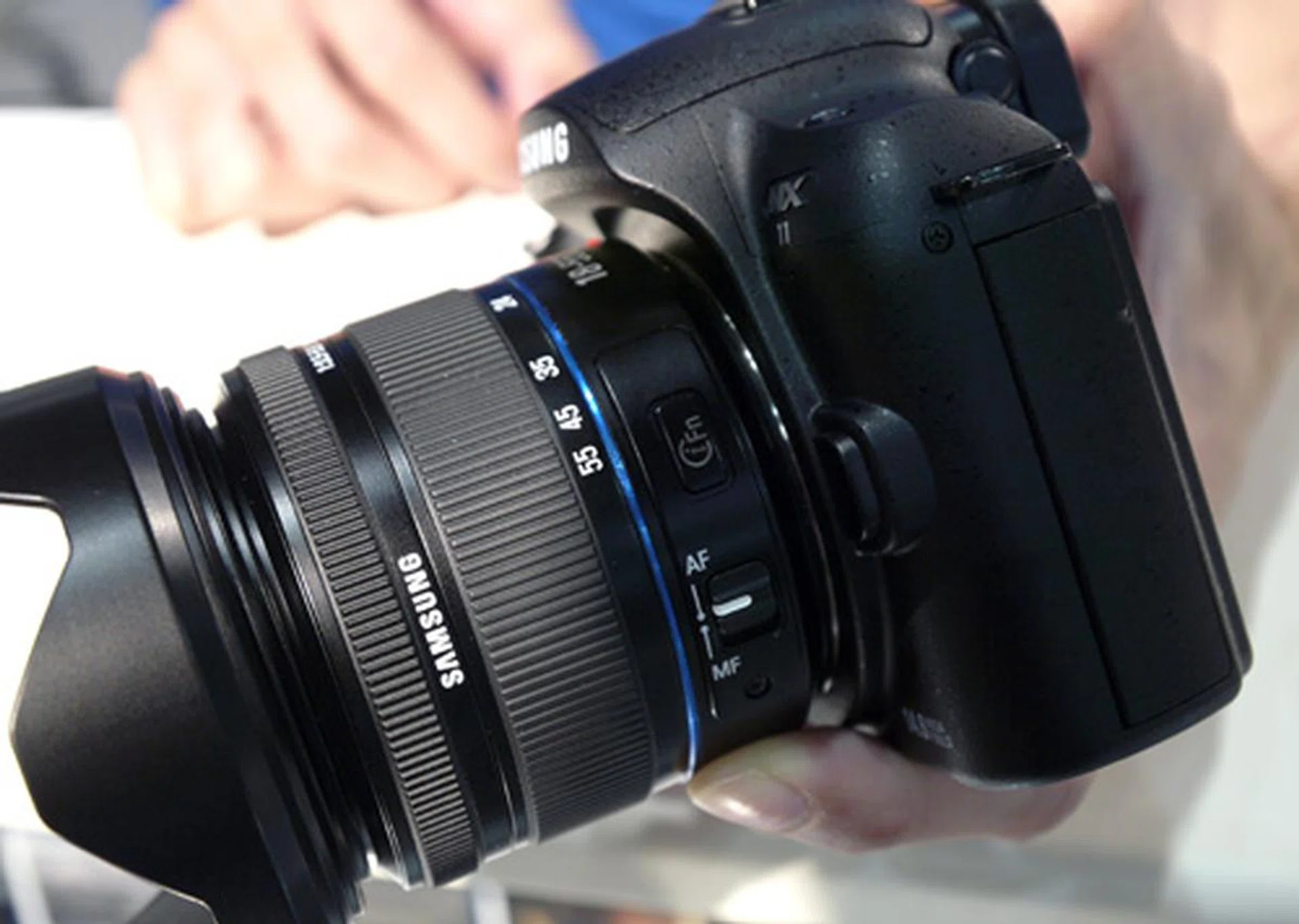 The new i-Function feature will enable photographers to access settings such as shutter speed, white balance and ISO without having to remove their grip on the lens. The new NX11 will carry the APS-C sensor which is just a tad bigger than a Micro Four-Third's sensor.