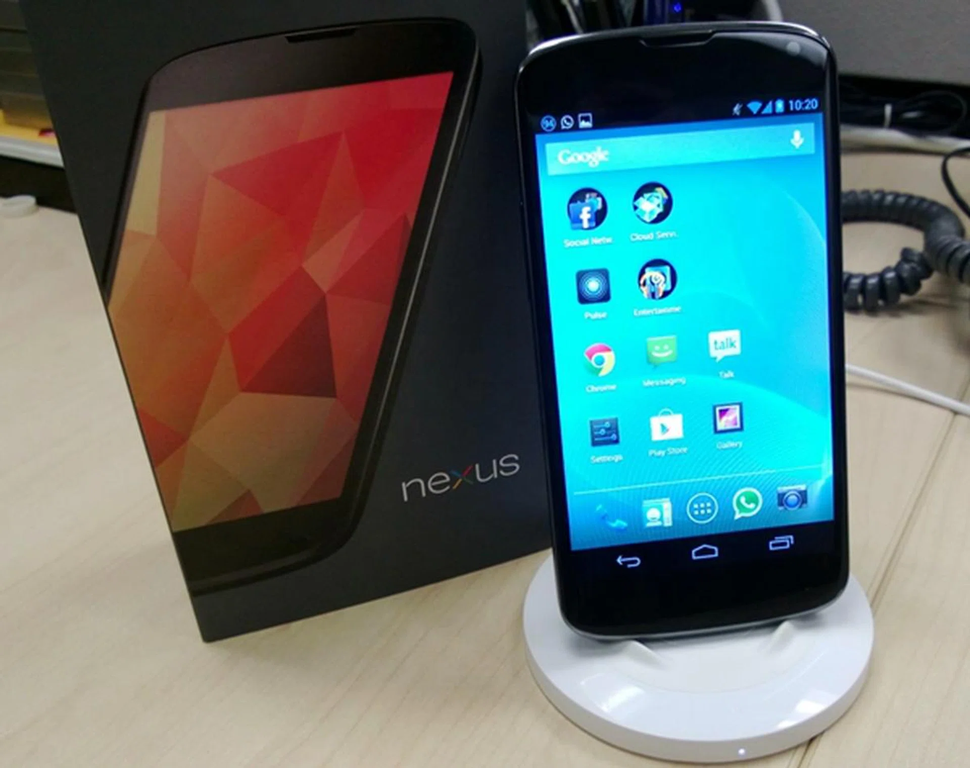 As the LG Nexus 4 supports the Qi wireless charging standard, it can be used with Nokia's wireless charging plate albeit with some luck.