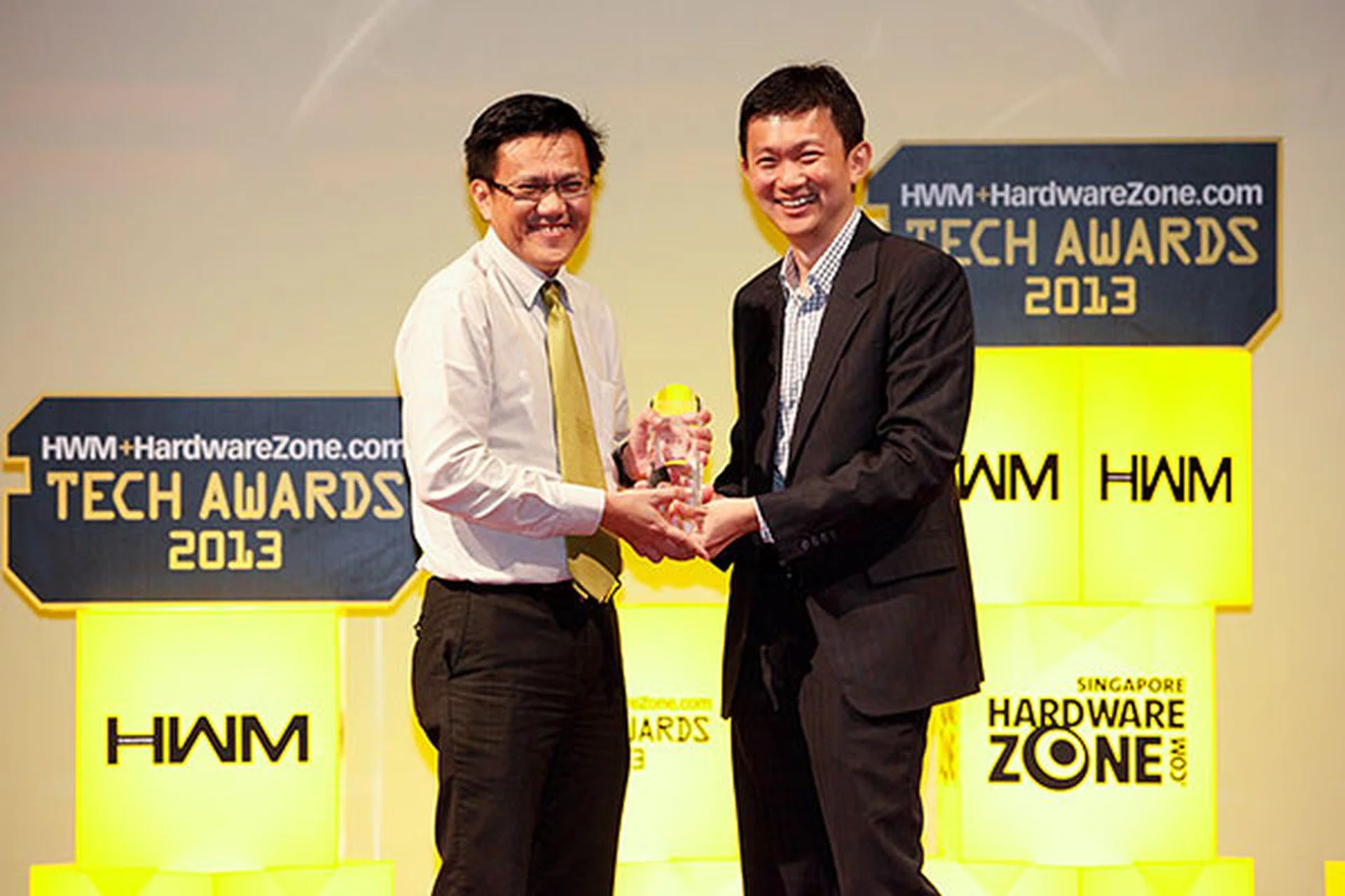 Canon won a total of seven awards: four Readers' Choice awards (Best Point & Shoot, DSLR, HD Camcorder, and Laser Printer Brand) and two Editor's Choice awards (PowerShot SX260 HS for Best Point & Shoot Camera and EOS 650D for Best Entry-level DSLR). Here's Mr. Andrew Koh, Senior Director & General Manager for the Consumer Imaging & Information Division of Canon Singapore accepting the awards.
