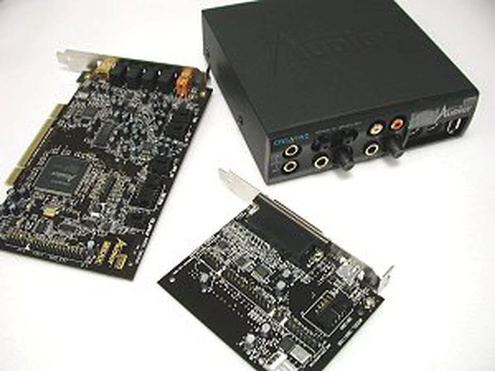  The Creative Sound Blaster AUDIGY Platinum eX scored a perfect 5 from us. Seen here clockwise from top left are the Audigy card, the External Audigy Drive and Audigy Extension Card.  